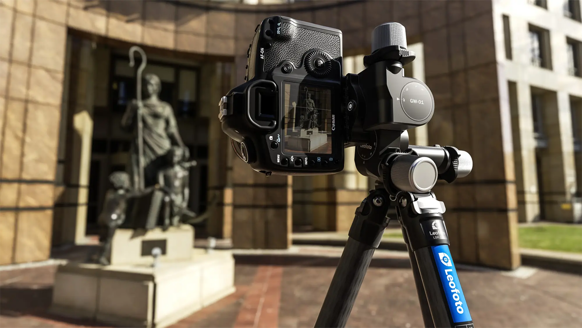 Leofoto 3-way geared tripod head with camera mounted for precise photography outdoors