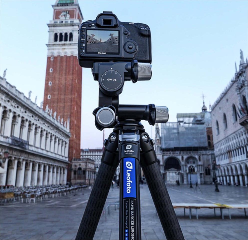 Leofoto 3-way geared tripod head with camera set up in a scenic outdoor location