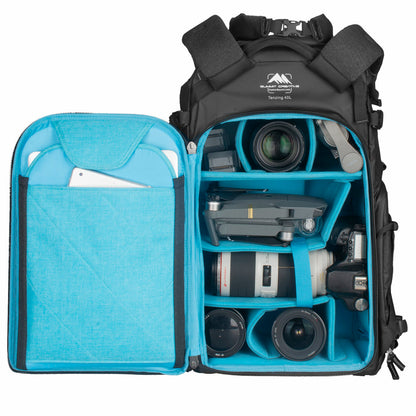 Interior view of Summit Creative camera backpack with padded compartments for lenses and equipment storage