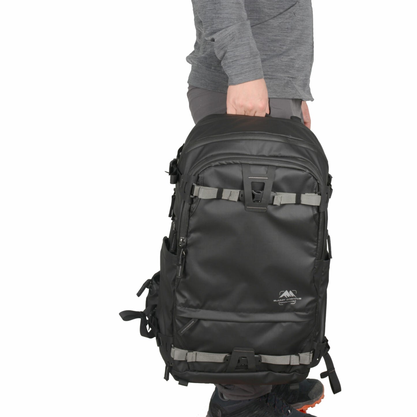 Summit Creative camera backpack in black, designed for photographers on the go with ample storage space