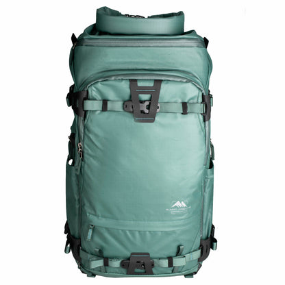 Summit Creative camera backpack in teal with adjustable straps and multiple compartments for photographers