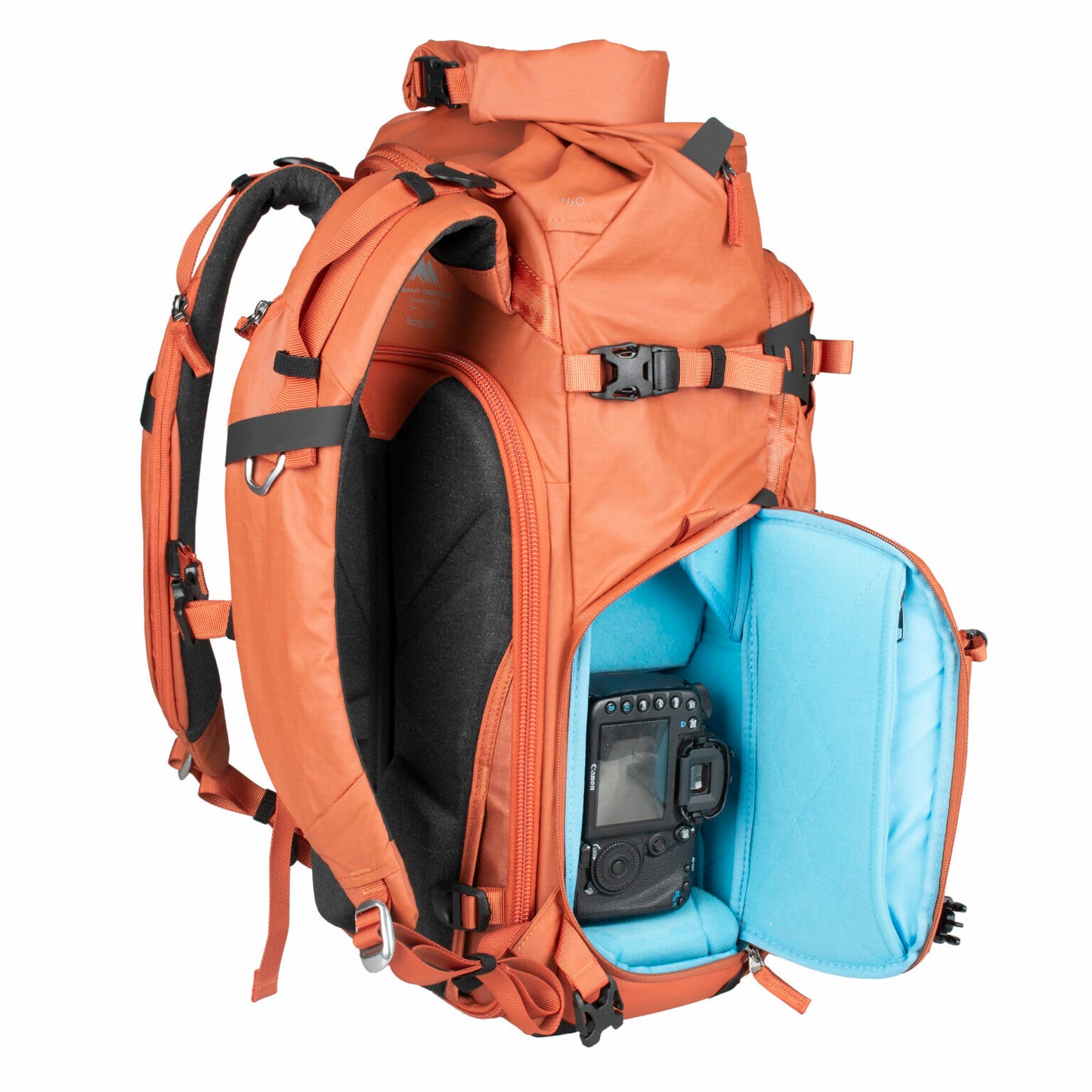 Summit Creative camera backpack in orange with padded compartment for camera and accessories