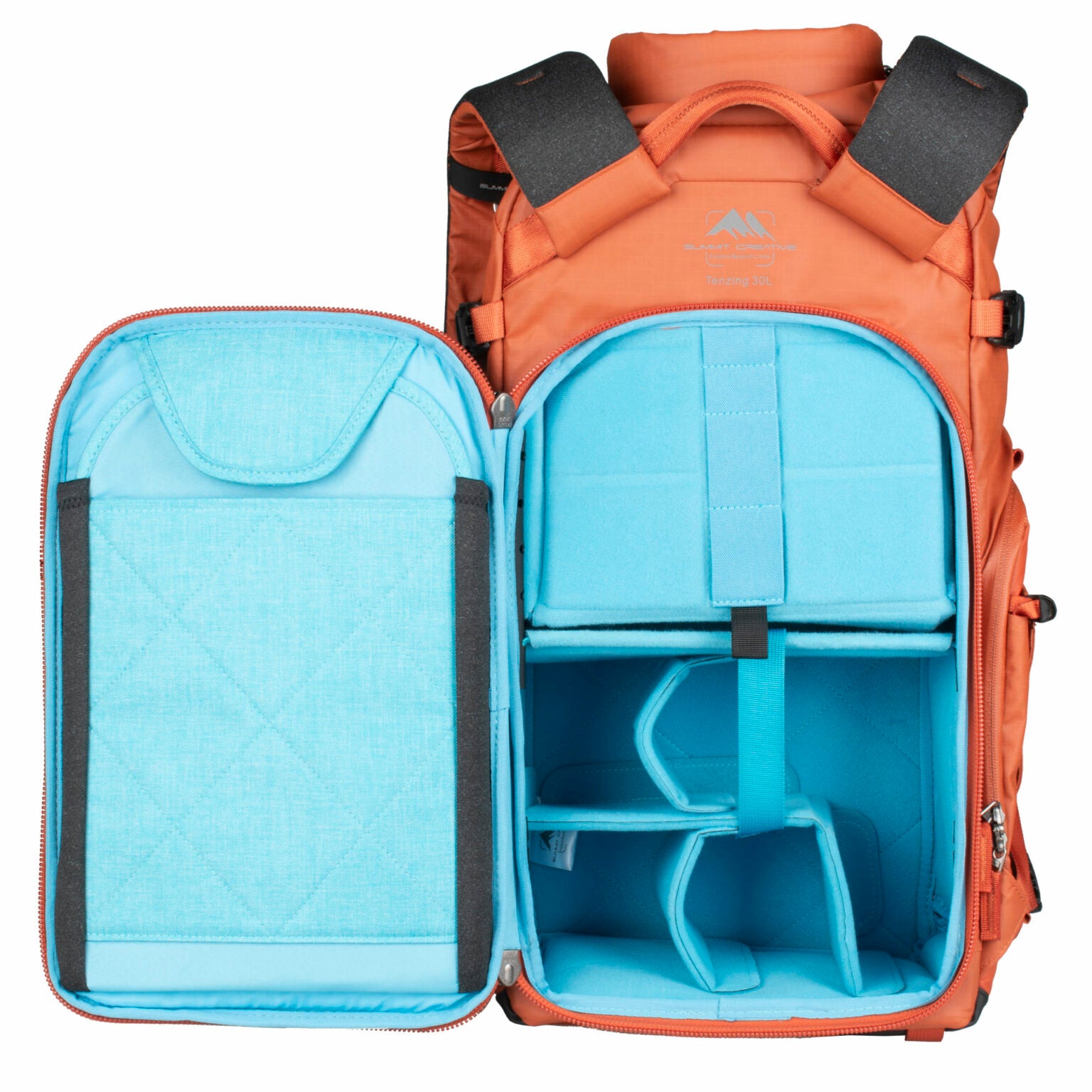 Summit Creative camera backpack in orange with blue interior compartments for organizing camera gear