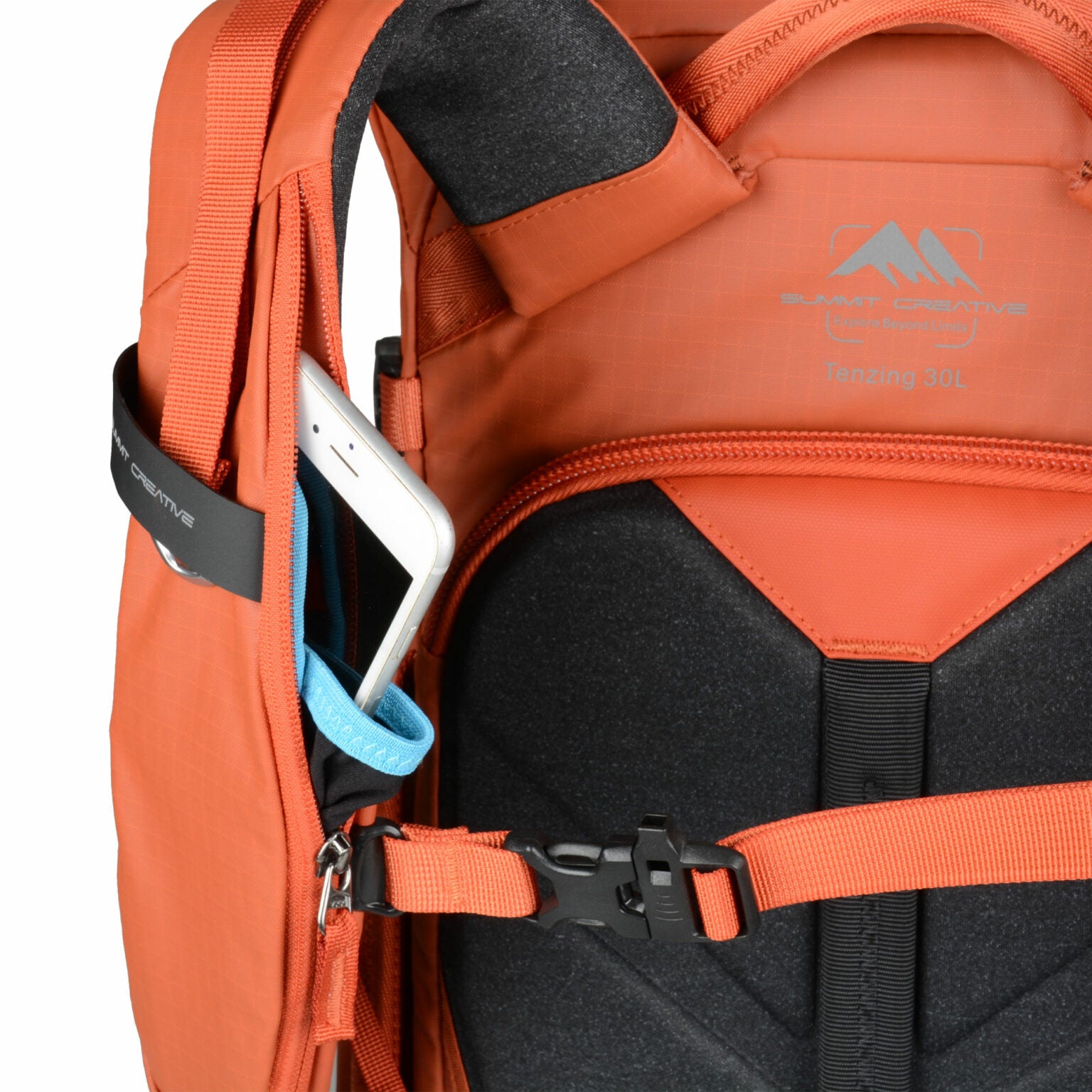 Summit Creative camera backpack in orange with adjustable straps and smartphone pocket for photographers