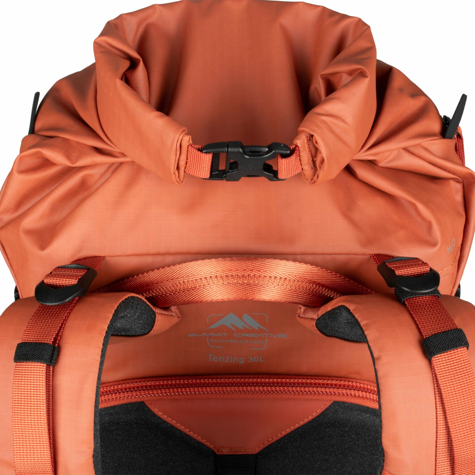 Summit Creative camera backpack in orange with a roll-top closure and adjustable straps for easy access