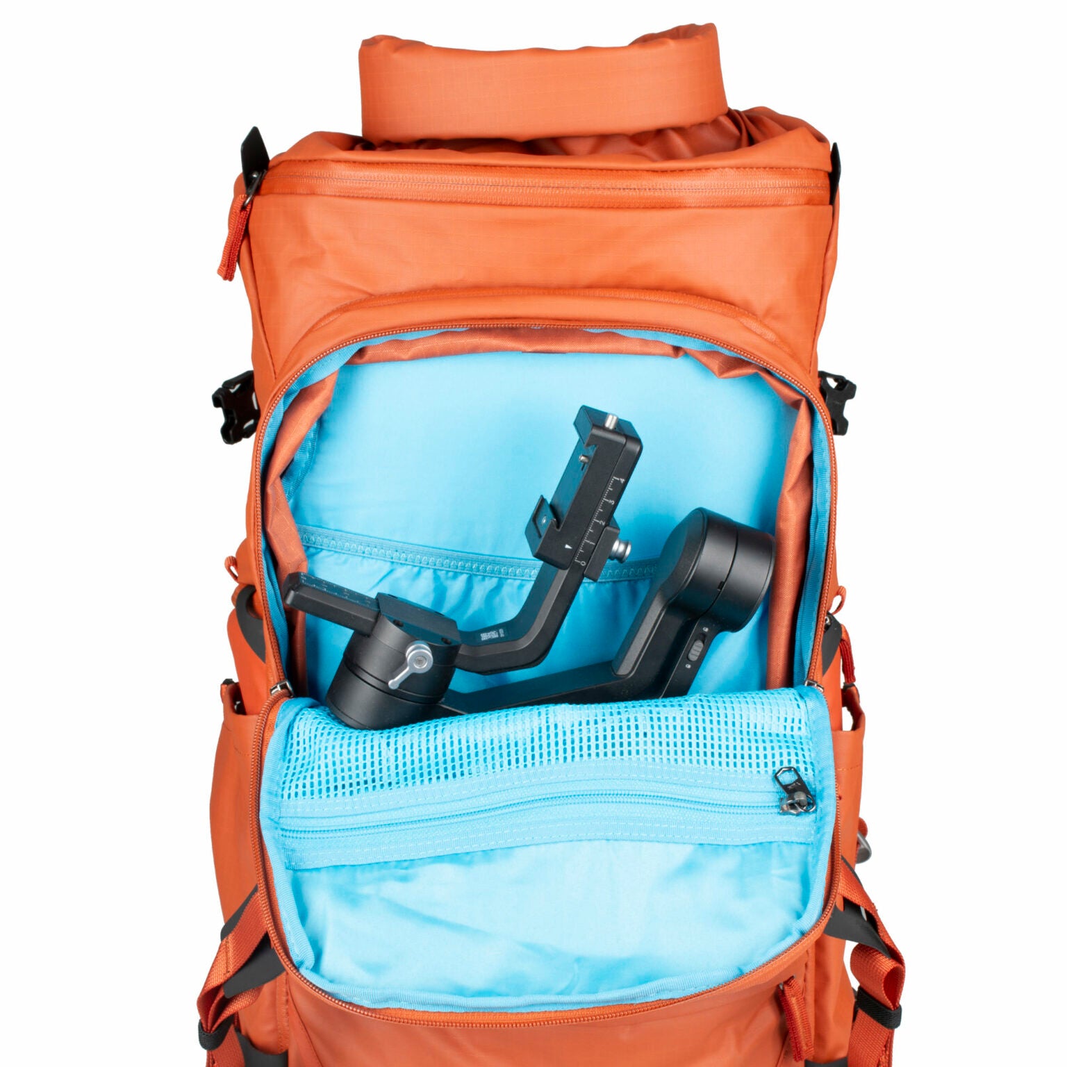 Summit Creative camera backpack featuring a spacious interior with a gimbal and bright blue lining
