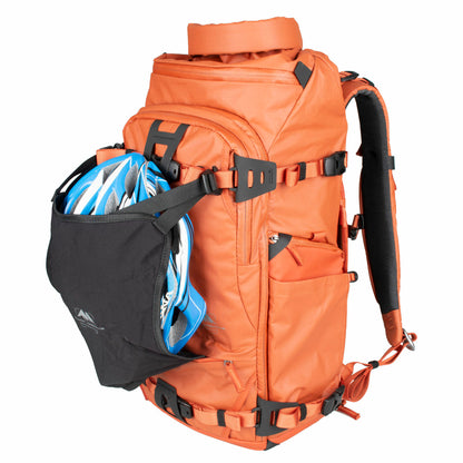 Summit Creative camera backpack in orange, designed for photographers with ample storage and versatile pockets